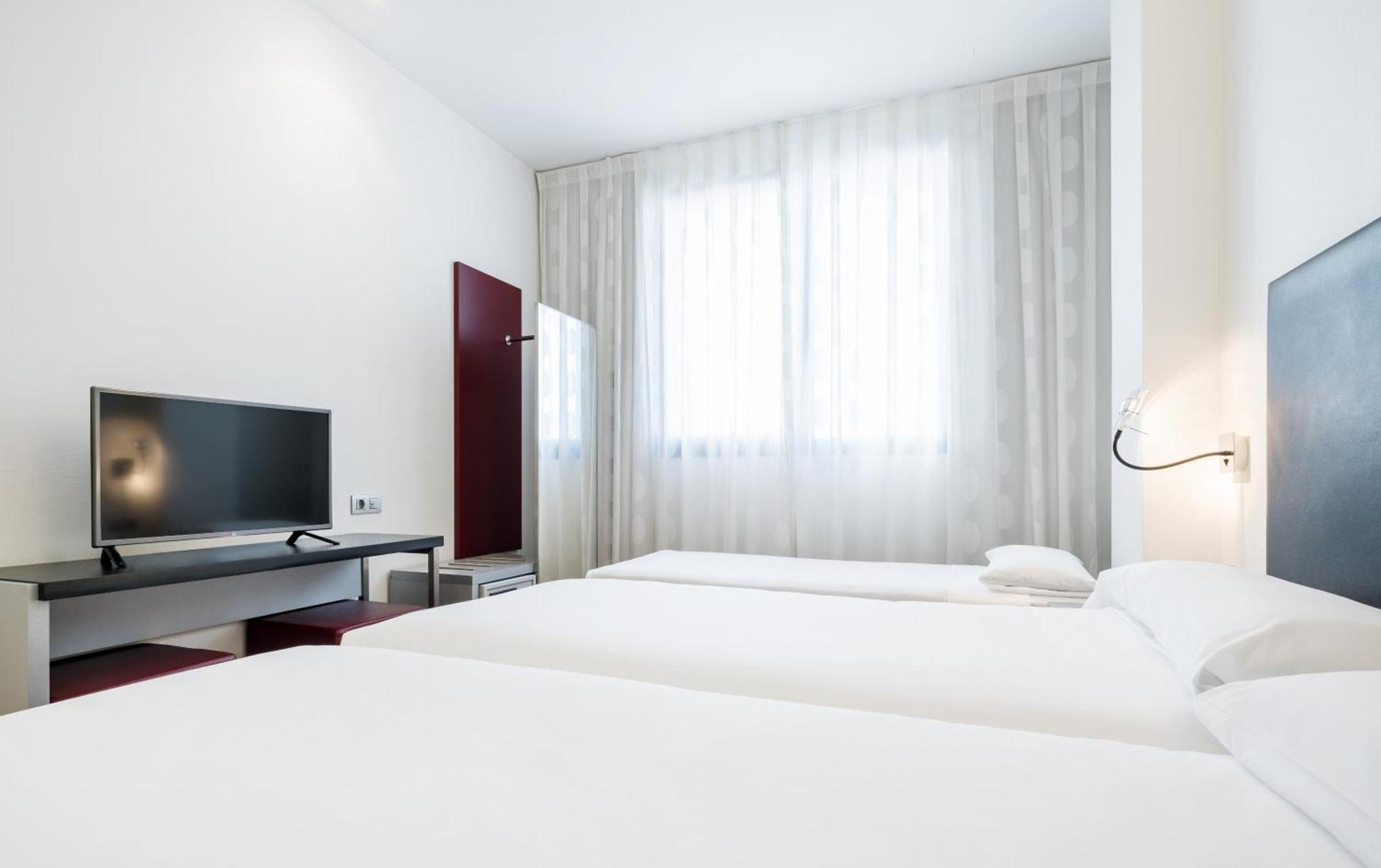 Triple Room (2 Adults + 1 Child)